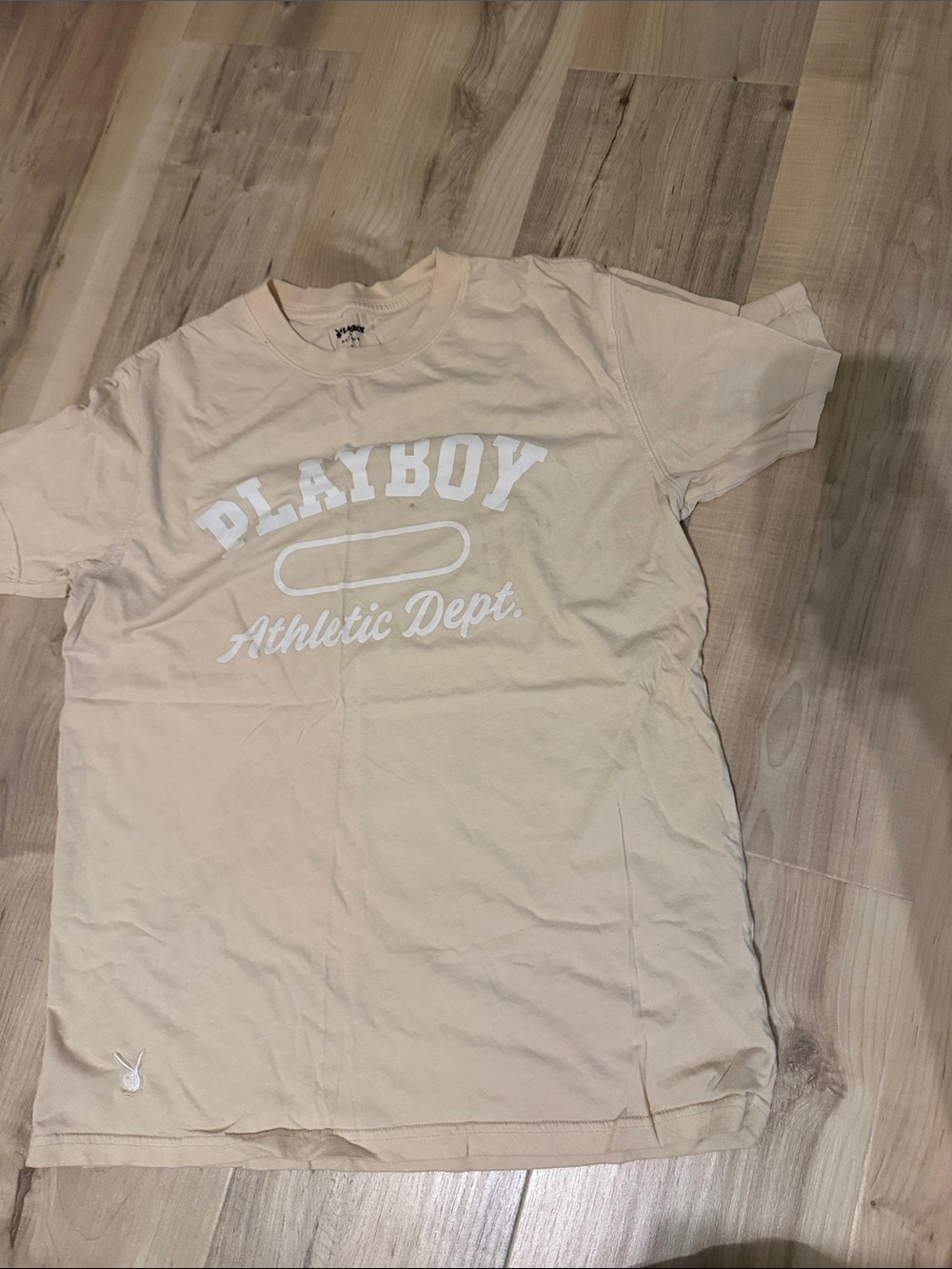 size small playboy cream colored t shirt